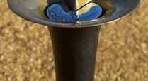 Close-up-of-trumpet-drinking-fountain-in-kensington-gardens_signpost